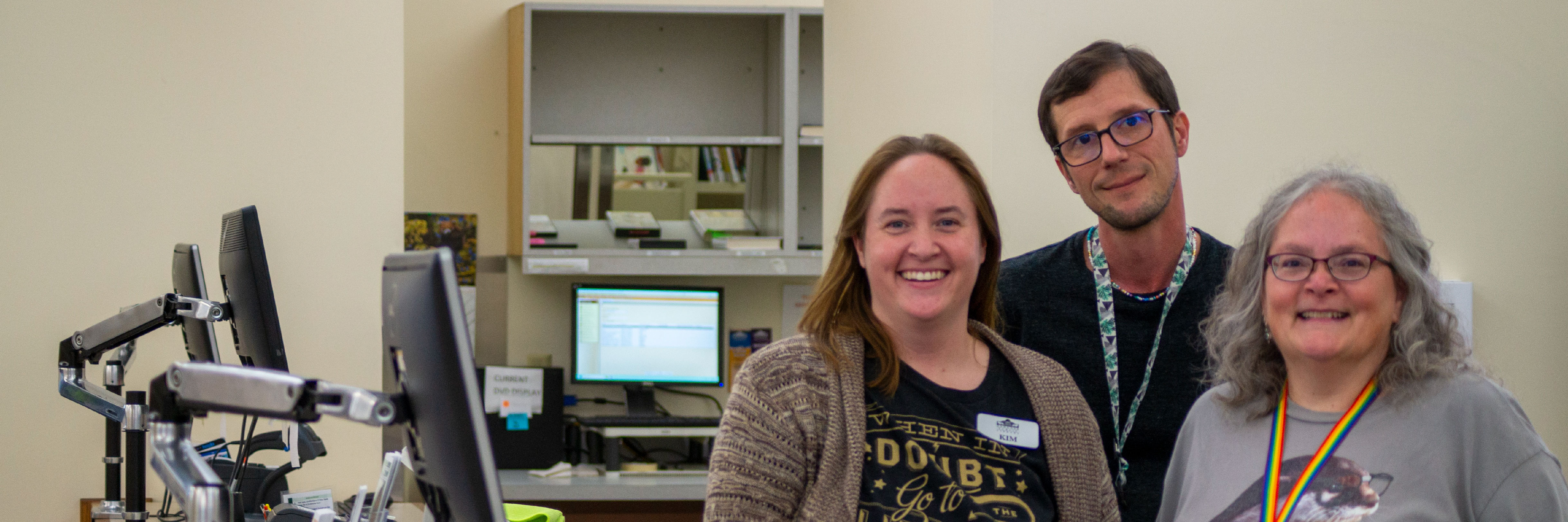 Oshkosh Library staff smiling 