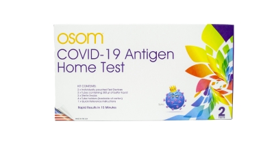 A covid testing kit can be seen in it's packaging.