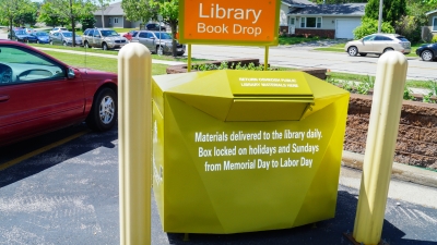 A green Book drop is pictured at the evergreen location