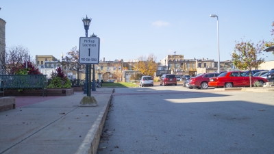 Outside the library, a pickup sign can be seen