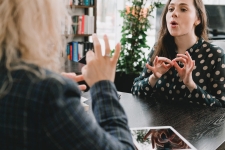 Gale Courses; Languages resource image showing two women practicing sign language