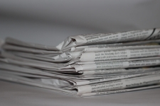 Newspaper Source Plus resource image showing a stack of newspapers