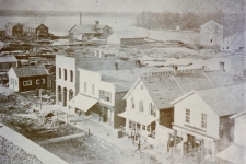 Recollection Wisconsin resource image showing a black and white historical photo of the early days in a Wisconsin town