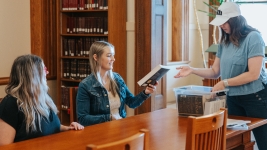 Book club members meeting to read