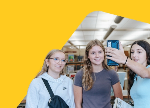 A group of Teens pose for a selfie