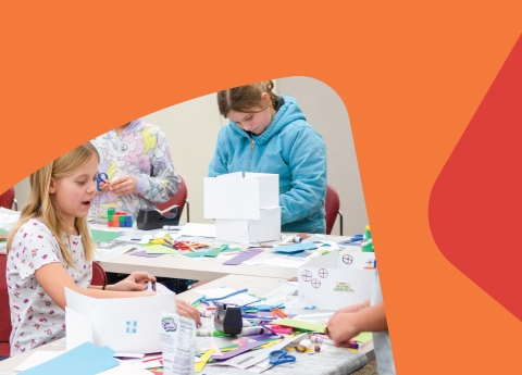 A group of young kids with craft supplies