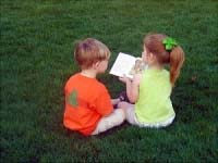 Children Reading a Book